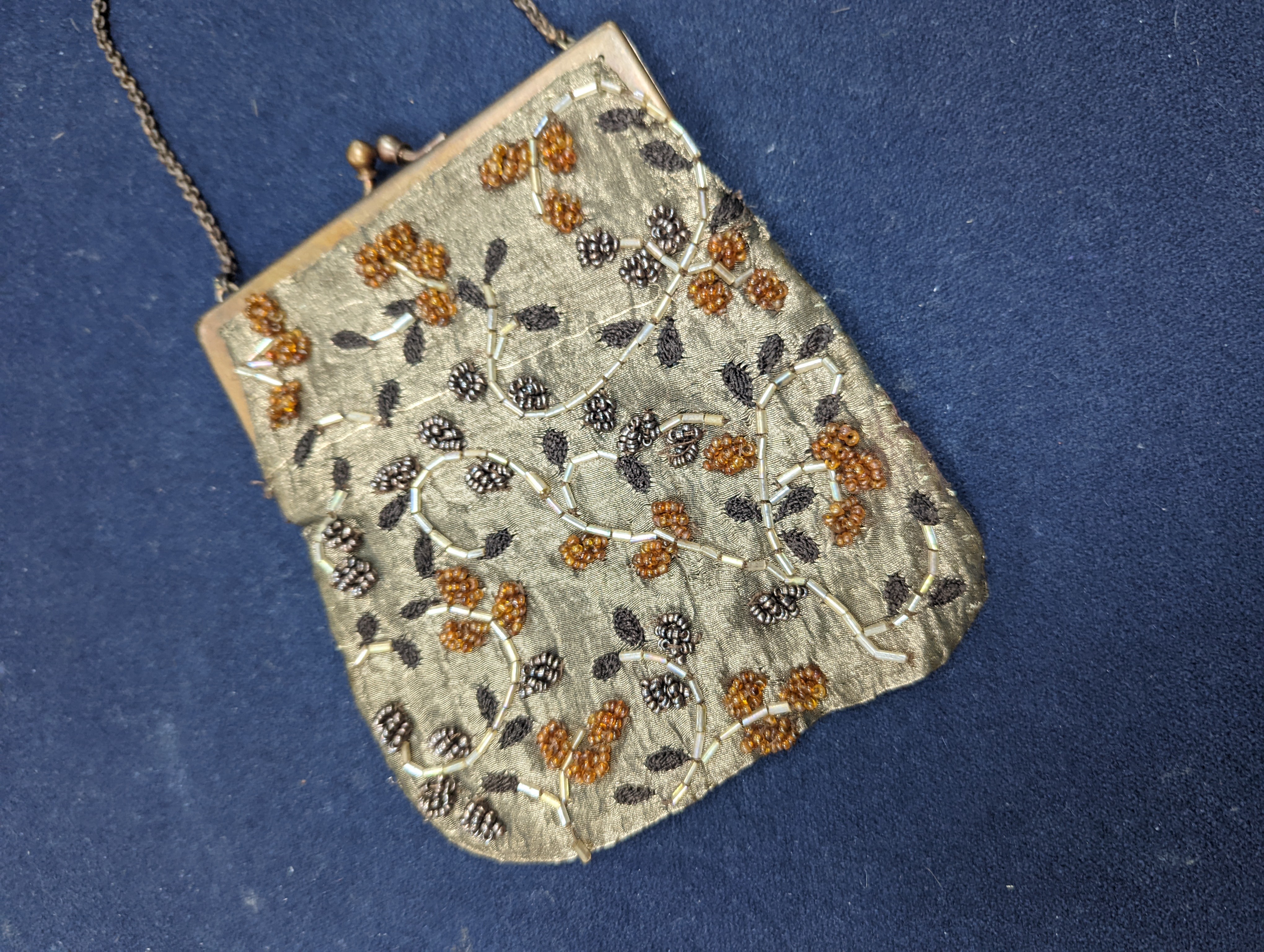 A fine tapestry clutch bag together with a collection of beaded petit point and lurex evening bags (7)